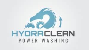 Incorporating the essence of fire and rebirth, the logo for HydraClean Power Washing features a stylized blue dragon entwined with water waves, akin to a phoenix rising from ashes. This symbolizes both transformation and innovation, key elements of digital marketing's ever-changing landscape. The bold uppercase "HYDRA CLEAN" text stands strong like a legendary creature's name, while the smaller "POWER WASHING" letters carry the precision of an SEO strategy as intricate and captivating as any WordPress design.