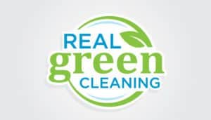 The image bursts forth, featuring a logo where "Real Green Cleaning" unfurls in vivid blue and green letters, much like a phoenix emerging from flames. A verdant leaf is intricately woven into the design, symbolizing eco-friendly cleaning services with the vitality of nature's resurgence. This emblem serves as an ideal spark for igniting small business marketing endeavors.