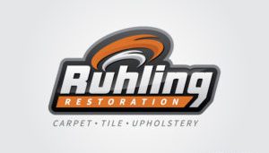 Emblazoned in hues of vibrant orange and sleek gray, the Ruhling Restoration logo rises with fiery elegance. At its core, a phoenix-like design symbolizes rebirth and renewal, capturing the essence of restoration. Below this dynamic emblem, a concise tagline elegantly lists "Carpet • Tile • Upholstery," ensuring clarity and focus for small business marketing pursuits.