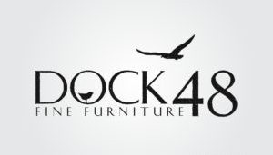 Emblazoned with a fiery elegance, the logo for "Dock48 Fine Furniture" features stylized text, highlighted by the silhouette of a phoenix soaring over the "48." This design is ideal for small business marketing and elevates your web design presence to new heights.