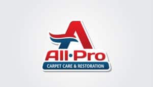 The logo of All-Pro Carpet Care & Restoration blazes with the imagery of fire and renewal, featuring a dynamic, stylized red and blue "A" that soars above the company name in bold red letters, underscored by a vibrant blue line. This striking design, reminiscent of a phoenix rising from the ashes, commands attention with its confident presence against a pristine white backdrop—an ideal emblem for small business marketing.